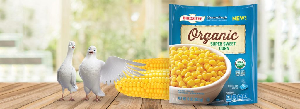Birdseye birds with some corn and packaging.